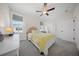 Cozy bedroom featuring a queen bed, natural light, and a ceiling fan at 3785 Summerton St, Mount Pleasant, SC 29466