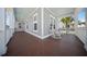 Inviting front porch with rocking chairs, wood flooring, and views of the neighborhood at 3785 Summerton St, Mount Pleasant, SC 29466