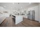 Spacious kitchen with white cabinets, stainless steel appliances, and a large center island at 3785 Summerton St, Mount Pleasant, SC 29466