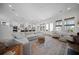 Spacious living room with large sectional, rug, and an open-concept kitchen at 3785 Summerton St, Mount Pleasant, SC 29466