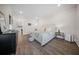 Bedroom with wood floors, minimalist decor, and doorway leading to kitchen at 3785 Summerton St, Mount Pleasant, SC 29466