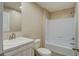 Bathroom featuring single sink, vanity, toilet, and a shower-tub combination with neutral walls at 413 Peacock Ln, Summerville, SC 29486