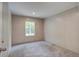 Bedroom features neutral carpet and light walls, complemented by a window for natural light at 413 Peacock Ln, Summerville, SC 29486