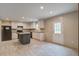 Modern kitchen featuring stainless steel appliances, white cabinetry, an island, and plenty of natural light for culinary enthusiasts at 413 Peacock Ln, Summerville, SC 29486