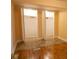 Bedroom features hardwood floors, a window, and closet at 424 Salley Ackerman Dr, Cottageville, SC 29435