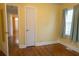 This bedroom features a wooden floor, neutral paint, a window and is ready for customization at 424 Salley Ackerman Dr, Cottageville, SC 29435