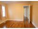 Bedroom offers a neutral color palette, hardwood floors, and window at 424 Salley Ackerman Dr, Cottageville, SC 29435