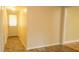 Hallway view shows a closed closet, entry door, and view to another room at 424 Salley Ackerman Dr, Cottageville, SC 29435
