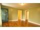 Bright living room with hardwood floors, neutral walls, and ample natural light at 424 Salley Ackerman Dr, Cottageville, SC 29435