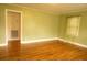 Inviting living room with hardwood floors, soft walls, and plenty of natural light at 424 Salley Ackerman Dr, Cottageville, SC 29435