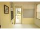 This sunroom features light walls, several windows, and is ready for customization at 424 Salley Ackerman Dr, Cottageville, SC 29435