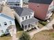 Aerial view of a neighborhood highlighting a home with a screened in back porch at 4603 Scout Aly, North Charleston, SC 29405