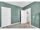 Comfortable bedroom boasts neutral walls and convenient access to additional rooms at 4603 Scout Aly, North Charleston, SC 29405