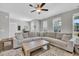 Inviting living room boasts a large sectional, hardwood floors, and stylish decor at 4603 Scout Aly, North Charleston, SC 29405