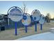 A Park Circle Playground sign near play structures with a modern design at 4603 Scout Aly, North Charleston, SC 29405