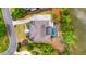 Aerial view of a luxurious house with a pool, lush landscaping, and waterfront access at 4874 Sound View Dr, Mount Pleasant, SC 29466