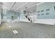 Spacious ballroom featuring high ceilings, chandeliers, a fireplace, and a grand staircase at 4874 Sound View Dr, Mount Pleasant, SC 29466
