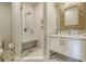 Elegant bathroom featuring a tiled shower with glass door and a vanity with marble countertop at 4874 Sound View Dr, Mount Pleasant, SC 29466