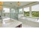 Luxurious bathroom with walk-in shower, soaking tub, dual vanities and high-end finishes at 4874 Sound View Dr, Mount Pleasant, SC 29466