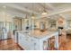 Open kitchen with large island, stainless steel appliances, and hardwood floors at 4874 Sound View Dr, Mount Pleasant, SC 29466