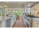 Modern kitchen with marble island, stainless steel appliances, and gas range at 4874 Sound View Dr, Mount Pleasant, SC 29466