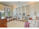 Elegant living room featuring custom built-ins, stylish furnishings, and ample natural light, perfect for relaxation at 4874 Sound View Dr, Mount Pleasant, SC 29466