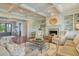 Cozy living room with fireplace, built-in shelves, and ample seating at 4874 Sound View Dr, Mount Pleasant, SC 29466