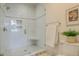 Modern shower with a glass enclosure and white subway tile, offering a clean and luxurious bathing experience at 4874 Sound View Dr, Mount Pleasant, SC 29466