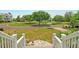 Scenic street view of the neighborhood pond and cul-de-sac from the front porch at 4874 Sound View Dr, Mount Pleasant, SC 29466