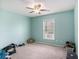 Light-filled bedroom featuring carpeted floors, a ceiling fan and a sunlit window at 4987 Ballantine Dr, Summerville, SC 29485