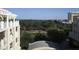 Balcony view showcasing city buildings with surrounding lush trees and greenery in the distance at 5009 Old Bridgeview Ln # 5009, Charleston, SC 29403