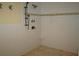 Bathroom featuring a tiled walk-in shower with bronze fixtures and a built-in shelf at 5009 Old Bridgeview Ln # 5009, Charleston, SC 29403