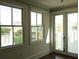 Bedroom featuring large windows with bright, natural light and balcony access at 5009 Old Bridgeview Ln # 5009, Charleston, SC 29403