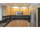 Kitchen with stainless steel appliances and dark granite countertops at 5009 Old Bridgeview Ln # 5009, Charleston, SC 29403