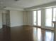 Bright living room features hardwood floors, large windows, and ample natural light at 5009 Old Bridgeview Ln # 5009, Charleston, SC 29403