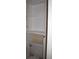 Toilet underneath a built-in shelving unit at 5009 Old Bridgeview Ln # 5009, Charleston, SC 29403