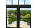Beautiful view of trees and sky from a window with grid panes at 5009 Old Bridgeview Ln # 5009, Charleston, SC 29403