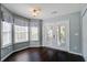Charming dining area with access to outdoor space through stylish French doors and large windows at 507 Tayrn Dr, Charleston, SC 29492