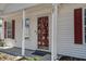 Close up of the home's front door, highlighting its clean design and inviting entry at 507 Tayrn Dr, Charleston, SC 29492