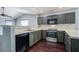 Spacious kitchen featuring modern appliances, generous counter space, and a convenient breakfast bar at 507 Tayrn Dr, Charleston, SC 29492