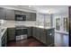 Well-equipped kitchen with stainless steel appliances and ample counter space, perfect for cooking at 507 Tayrn Dr, Charleston, SC 29492
