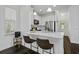 Charming eat-in kitchen with sleek white cabinets and stainless appliances at 5108 Celtic Dr, North Charleston, SC 29405