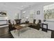 Comfortable living room featuring a sectional sofa, stylish coffee table, and modern decor at 5108 Celtic Dr, North Charleston, SC 29405