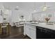 Open-concept kitchen and living space with an eat-in island and stainless appliances at 5108 Celtic Dr, North Charleston, SC 29405