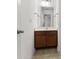 Bathroom vanity with wood cabinets, neutral tile floor, and white walls at 529 Pleasant Side Dr, Moncks Corner, SC 29461