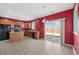 Eat-in kitchen featuring oak cabinets, black appliances, tile flooring, and sliding glass doors to yard at 529 Pleasant Side Dr, Moncks Corner, SC 29461