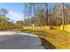 Expansive backyard featuring a concrete patio and a newly installed wooden fence for added privacy at 671 Riley Rd, Charleston, SC 29412