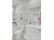 Bright bathroom featuring a combination tub/shower, white vanity, toilet, and modern finishes at 69 Arrowwood Way, Summerville, SC 29485