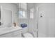 Bathroom showcasing vanity with sink, toilet, shower with glass door and window for natural light at 69 Arrowwood Way, Summerville, SC 29485