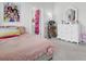 Bedroom with large bed, dresser, decor and ensuite bath provides a private retreat at 69 Arrowwood Way, Summerville, SC 29485